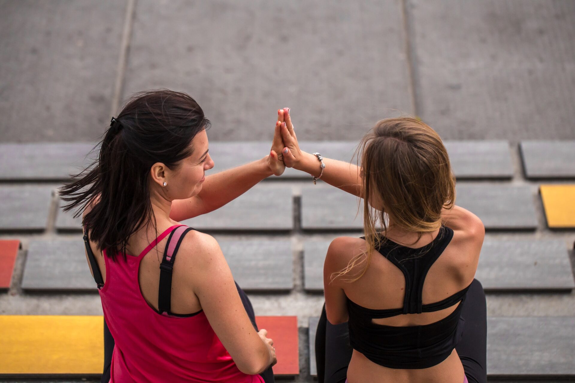 two girlfriends doing sports