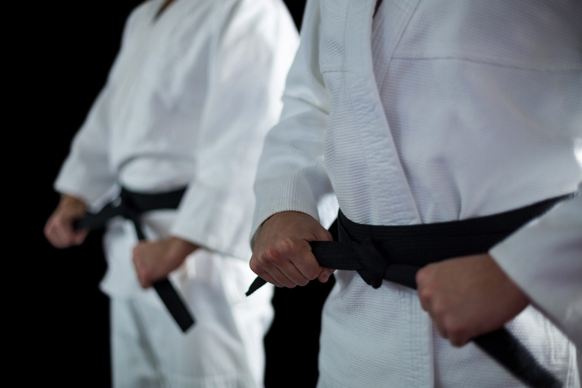 Two karate fighters performing karate stance